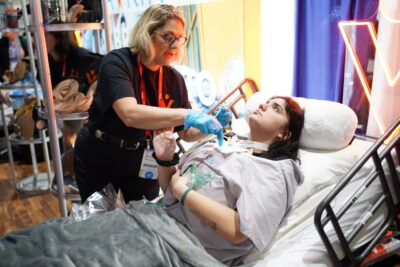 Amy Cowperthwait suctioning Avtrach patient at IMSH 2024
