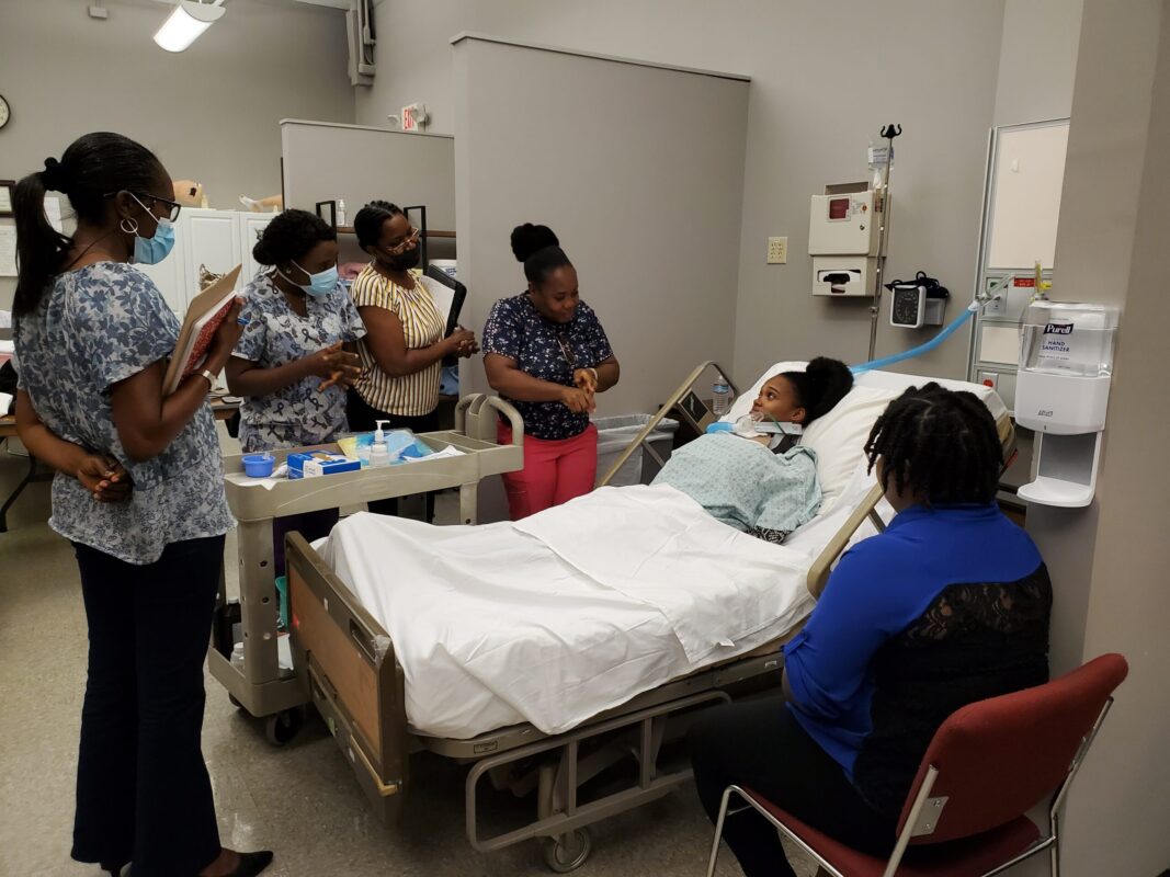 Regis College Highlights Wearable Simulators in Haiti Course