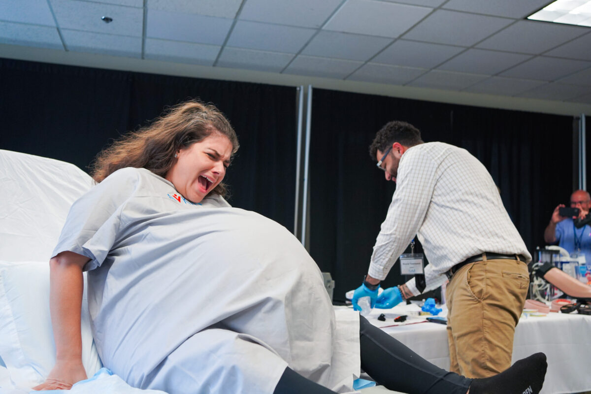 Standardized patient doing a birthing simulation with Avbirth